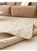 Tapis beige en laine, texture douce et confortable