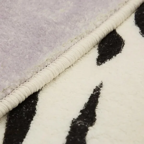 Tapis Peau de Vache, textile naturel pour ambiance rustique