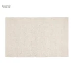 Tapis en laine aux couleurs neutres, facile à assortir