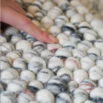 Tapis beige en laine, ajout chaleureux à votre décoration