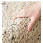 Tapis fait main, laine naturelle pour un confort optimal