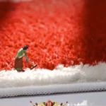 Tapis en formes géométriques dans une teinte bleu canard