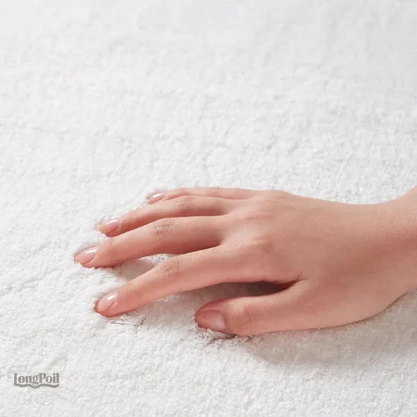 Tapis en forme irrégulière avec motifs orange et bleu
